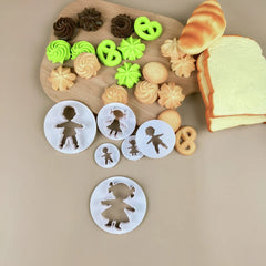 Biscuit cutters, boy and girl figures, 3 pieces